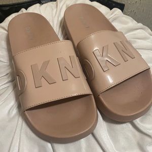 Tan DKNY rubber slide